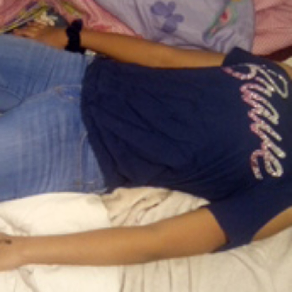 Blue shoulder showing sleeves spelling brave